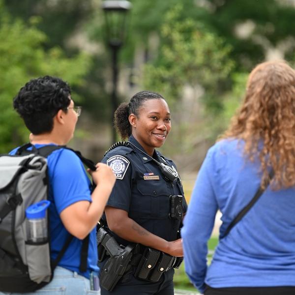 Police Officer with students
