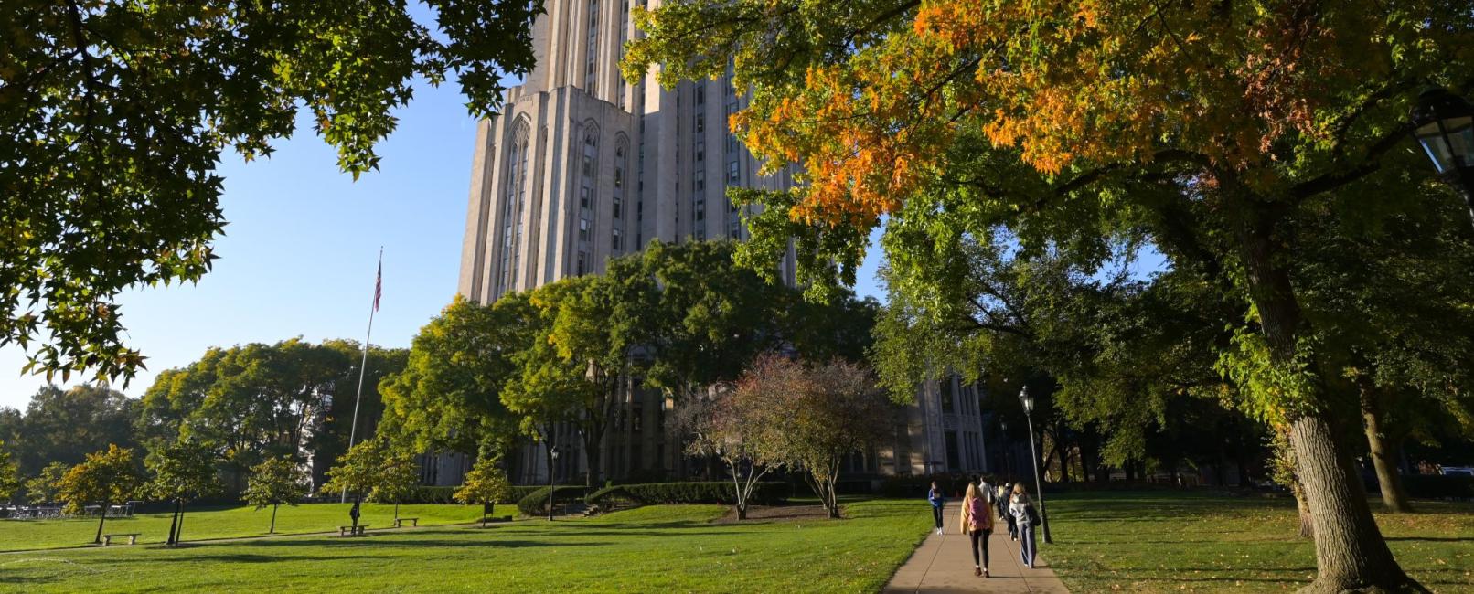 Students walking outside the Cathedral of Learning